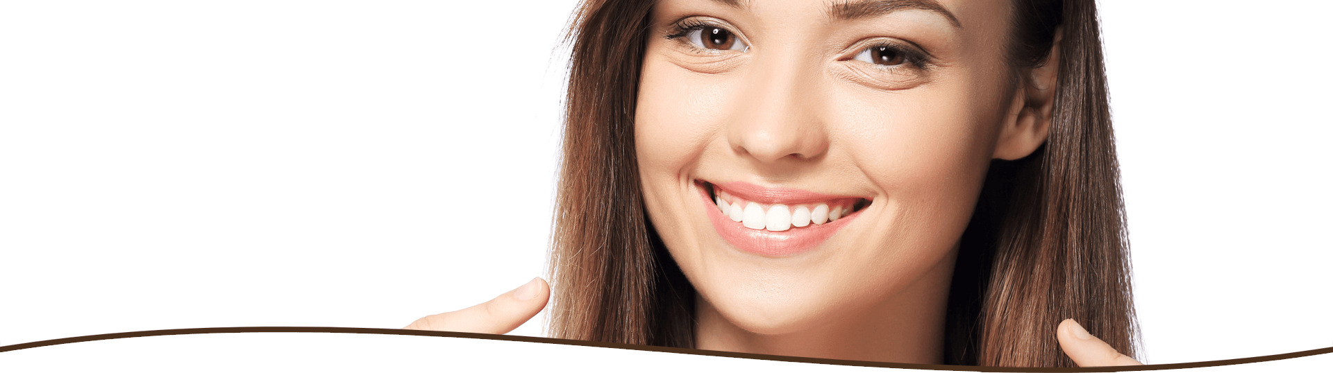 Smiling woman pointing at her teeth