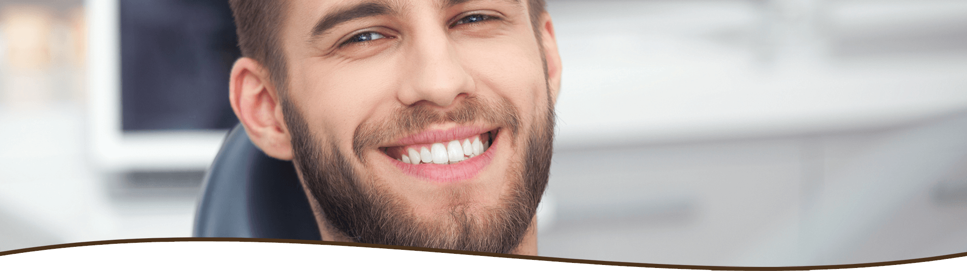 Smiling man at dental office